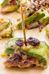 Zucchini and bacon rolls baked