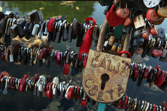 Love locks fixed in the Dmitrov Kremlin, Russia.
