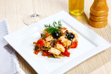 Swordish with tomatoes, capers and olives, sicilian recipe