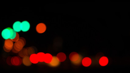 Abstract background of blurred lights with bokeh effect.