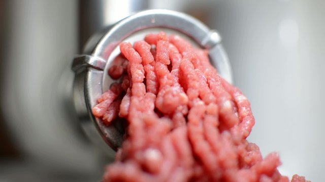 Meat grinder mince beef and pork meat
