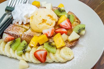 Honey toast with mix fruit.