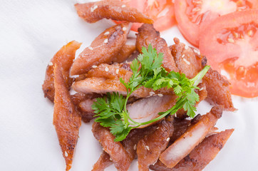 fried pork with white sesame seeds