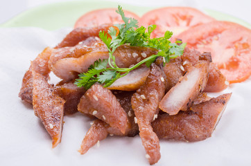 fried pork with white sesame seeds