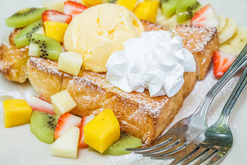 Honey toast with mix fruit.