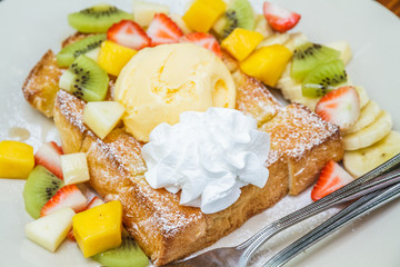 Honey toast with mix fruit.