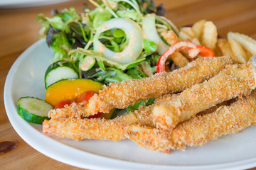Traditional English food - Fish and chips and salad