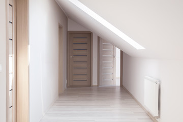 Corridor with beige doors - obrazy, fototapety, plakaty