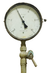 Old pressure gauge on an isolated background