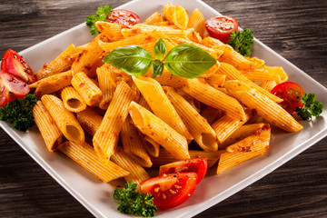 Pasta with meat, tomato sauce and vegetables