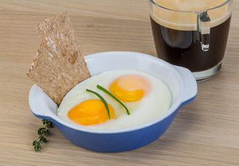 Breakfast with eggs and coffee