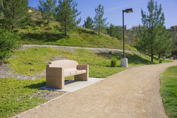 Park Bench on Dirt Path