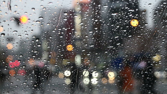 City commuters in rain