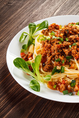 Pasta with meat, tomato sauce and vegetables