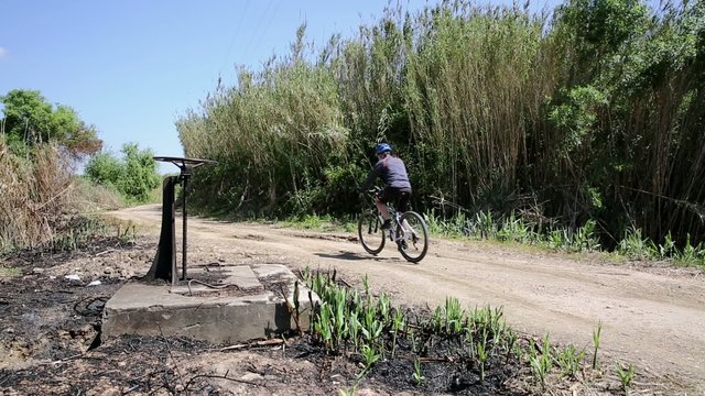 mountain bicycle riding in a country road