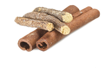 Cinnamon stick and Liqorice on the white