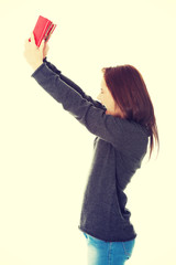 Young caucasian woman with empty wallet