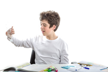 Caucasian smooth-skinned boy holding an empty clear plastic bott