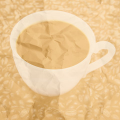 Cup silhouette from coffee on the old paper