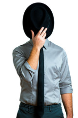 man in elegant suit that covers his face with a hat