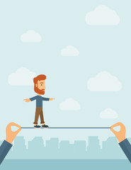 Businessman walking on wire.