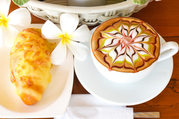 Fresh croissant with cup of coffee for breakfast