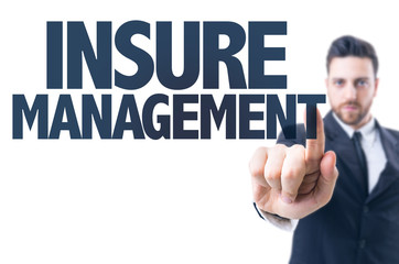 Business man pointing the text: Insure Management