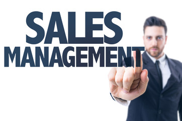 Business man pointing the text: Sales Management