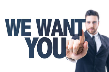Business man pointing the text: We Want You