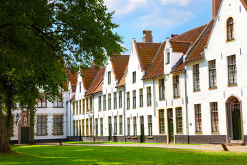 Fototapeta premium White houses in the court of The Begijnhof. Bruges, Belgium