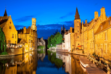 Fototapeta na wymiar Dock of the Rosary and Belfry at twilight. Bruges, Belgium