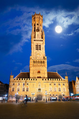 Fototapeta premium Bruges, Belgium: The Belfort under the moonlight