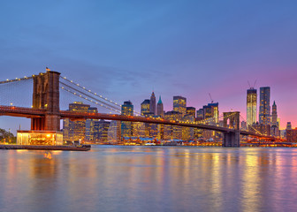 Fototapeta na wymiar Brooklyn bridge and Manhattan at dusk