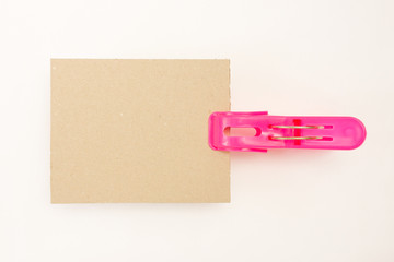 Cardboard with Pink Clothes Pin