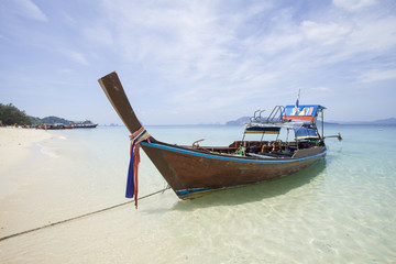 Fototapeta premium Original long tail boat on the beach at Trang, Thailand