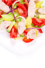 Warm meat salad with vegetables.