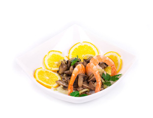 Shrimp salad with mushrooms close up.