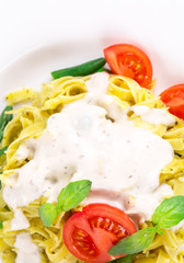 Tasty italian pasta with white sauce.