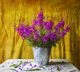 Still life with bouquet purple wild flowers