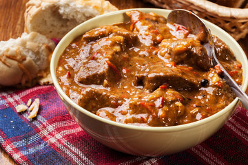 Beef stew served with crusty bread