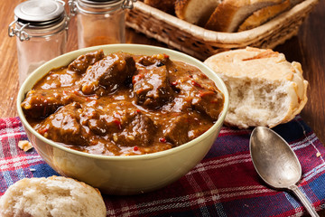 Beef stew served with crusty bread