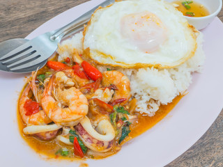 Thai food spicy squid and shrimp with fish sauce