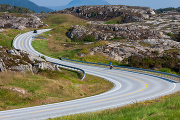 Biking in Norway against picturesque landscape