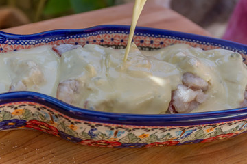 slightly fried fish slices ready for cooking