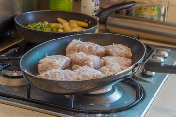 fish fillet cooking on fry pan, food preparation, cooking time