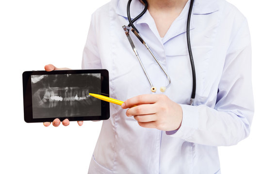 nurse points on tablet pc with human jaws