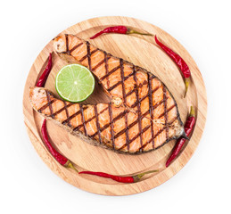 Salmon steak on platter.