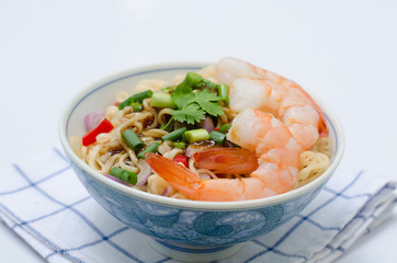 bowl of noodles with vegetables and prawn