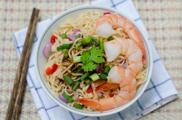 bowl of noodles with vegetables and prawn