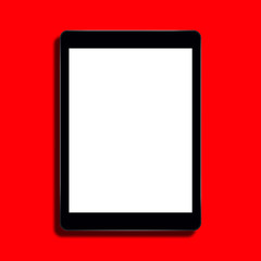 Blank tablet computer on red background